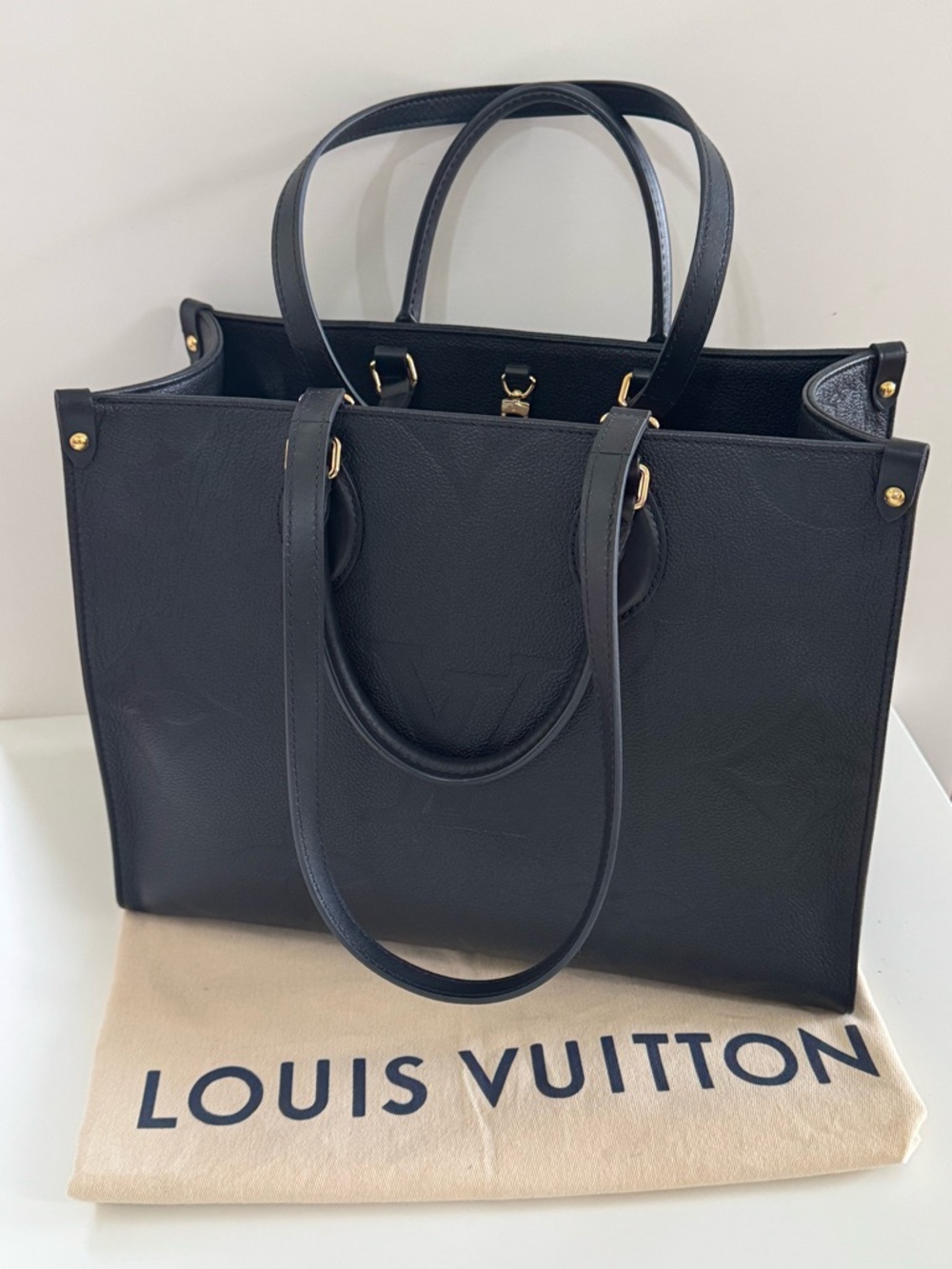 LIKE NEW - Louis Vuitton ON-THE-GO MM Black Leather Embossed Monogram